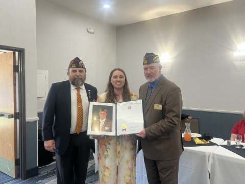 Mrs. Manning proudly receives the Citizenship Educator of the Year Award from veterans in recognition of her outstanding dedication to our students and community.